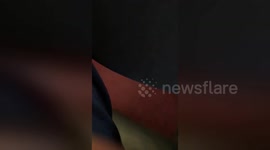 Newsflare Edit - Woman angers plane passengers by laying across premium seats