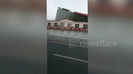 Man freaks out when powerful wind rips roof off building