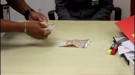 Airport security guard caught stealing cash from 89-YEAR-OLD tourist