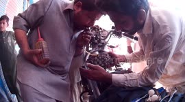Blow Gasoline through Engine, Roadside Motorcycle Repair in Pakistan