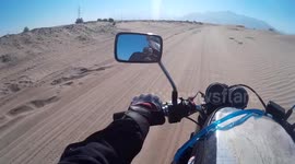 Motorcyclist Almost Falls in Dangerous Desert of Pakistan
