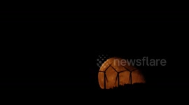 This mornings moon rise behind windmills over northern Ireland