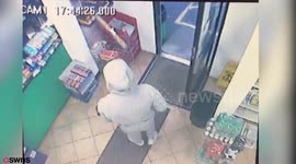 A 15-year-old thief chased away by a female shop worker - wielding a bottle of water
