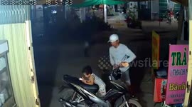 Moment brazen thief steals phone straight out of child's hands