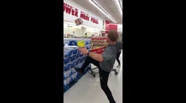 Watch man use amazing soccer moves to put groceries in cart