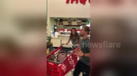 Watch man use amazing soccer moves to put groceries in cart