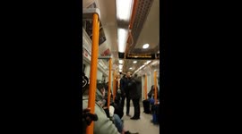 Big fight starts on London Train because man Speaks his MIND.