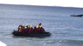 Tourists cruising in a Zodiac off Brown Bluff, Antarctic Peninsula