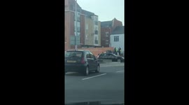 Man ploughs Porsche through wall in Colchester, UK