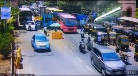 Terrifying moment car flees toll booth and rams worker