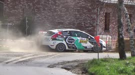 Rally car smashes hard into barrier during race in Belgium