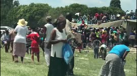 Looters in South Africa steal crashed lorry's washing powder