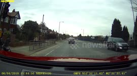 Young female driver with child in car mounting the curb p2