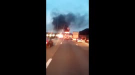 signposts above motorway in fire