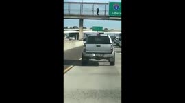 Dancing Mariachi on the bridge in Barrio over San Diego freeway