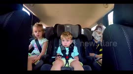 Kids Headbanging to Music in the Car