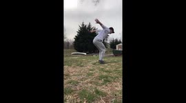 Man’s head nearly touches the ground while doing a low backflip