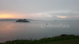 Sunrise over plymouth and homless camping under Plymouth ww2 battlements