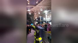Newsflare Edit - Liverpool Fans Celebrating After Reaching Semi Finals CL At Manchester Train station