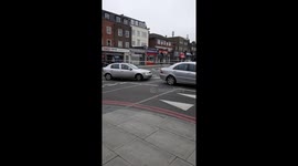 Police cordon off road after stabbing in Clapton, Hackney