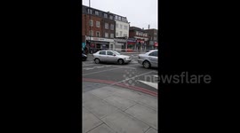 Police cordon off road after East London stabbing