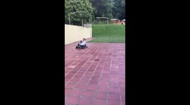 Kids driving a toy car