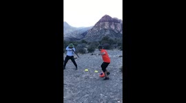 Soccer Players Wild West Showdown - Dribbling while being shot at!