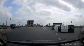 Pickup truck crosses the red light caused a crash with truck