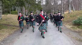 Balmoral Castle special event with Ballater Pipe Band arriving to play in front of the Castle