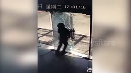 Distracted deliveryman shatters glass door by walking into it