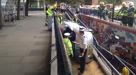 CAR CRASHES INTO SUBWAY