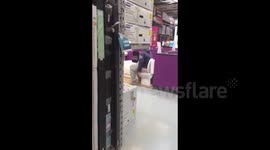 Man relieves himself in DIY shop display toilet
