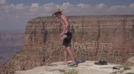 Man kicks a squirrel into the Grand Canyon