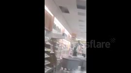 Supermarket roof collapses during storm