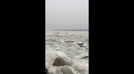 China northern river starts to melt in spring awakening