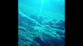 Flying home from Jamaica above the clouds