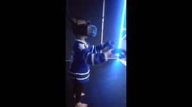 Little girl tries virtual reality game for the first time. It was almost too realistic !