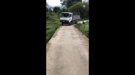 The truck driver crosses the dangerous road