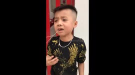 Dad attaches son's wobbly tooth to football and then kicks it