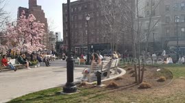New York, Greenwich Village - People enjoying Warm Hot day in Aids Memorial park