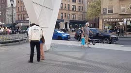 New York, Greenwich Village - People enjoying Warm Hot day in Aids Memorial park