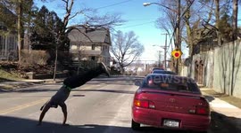 RAW VERSION: New Yorker performs spectacular backflip over parked car