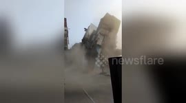 Terrifying moment abandoned building collapses