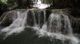 Incredible three tiered waterfall near Kupang, Indonesia. Air Terjun Oenesu.