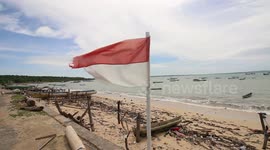 An Indonesian Flag Flies Along The Beach In West Timor Indonesia