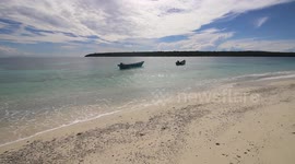 The whitest sand bluest water I've ever seen. this is Jaco Island, East Timor!