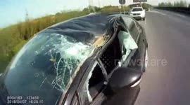 Flying tyre comes out of nowhere and smashes into windscreen