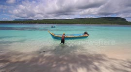 The bluest water and whitest sand I've ever seen! This is Jaco Island, a remote, and deserted tropical island off the coast of East Timor. There is clear blue water and pure white sand. It's a tropical paradise!