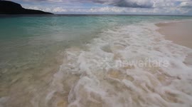 The bluest water and whitest sand I've ever seen! This is Jaco Island, a remote, and deserted tropical island off the coast of East Timor. There is clear blue water and pure white sand. It's a tropical paradise!