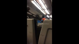 Train Driver has to lock doors after people climb out onto tracks